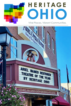 The Heritage Ohio Logo with stylized colorful shape of Ohio with a photo of the Ariel Opera House below shown with the marquee announcing the award.